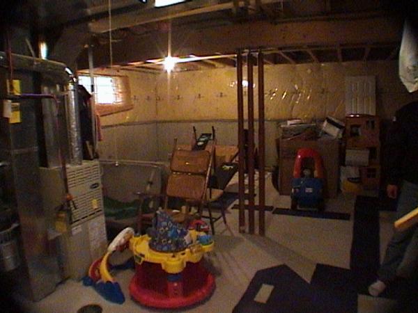 1. This is the basement of the house we purchased when we looked at it with the realtor.  The far Corner is where I will place the aquarium.  I planned everything around it, including a line to the city sewer to flush the filtration system and drain the tank, waterlines plumbed into filter for top-off, etc, and of course proper wiring and moisture barriers for such a large amount of water.