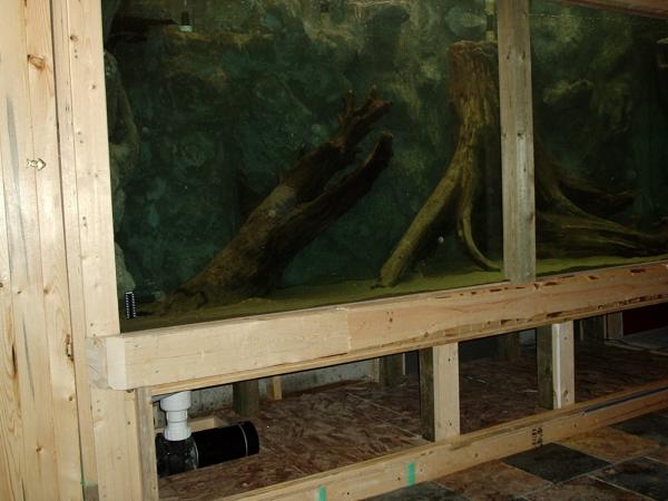 16. This is a photo of the aquarium at capacity. I calculated with the background and wood inside, I'm at about 900 gallons. It heated up quite nicely and I was able to keep a constant 25 degrees with minimal humidity.